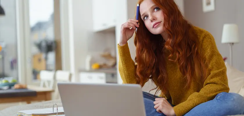 Woman Thinking About Renewing Home Warranty