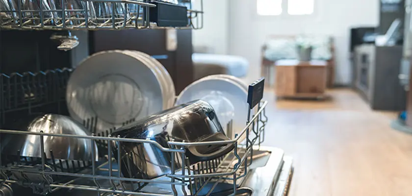 Dishwasher not draining? Try these 5 troubleshooting tips and learn about dishwasher home warranties for greater peace of mind.